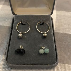 Sterling, silver hoops, with changeable gemstones.